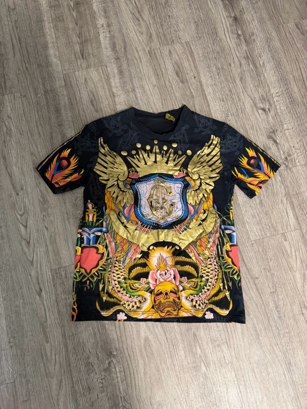 Christian audigier Black Graphic Tee with Gold Wings & Colorful Crest